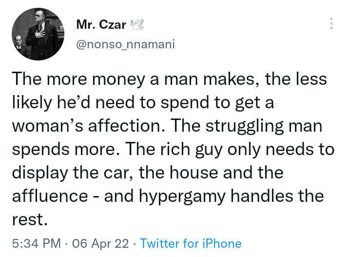 A confident couple engaged in deep conversation over dinner, symbolizing modern dating dynamics and the evolving nature of hypergamy.