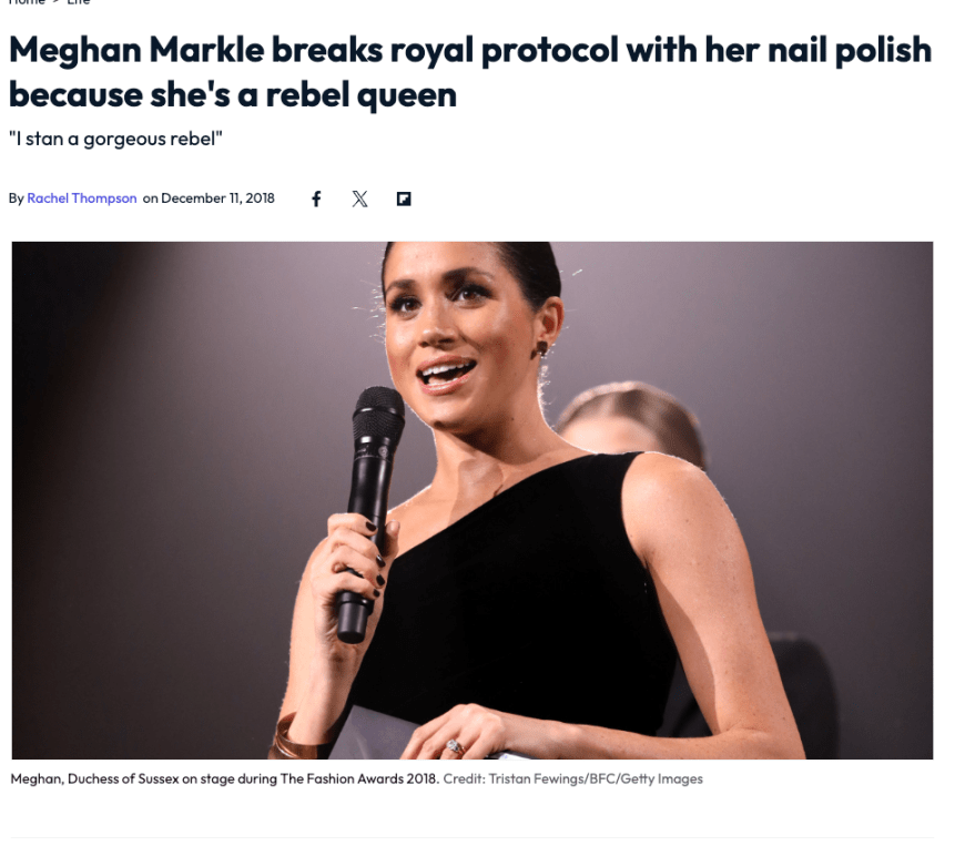 Meghan Markle at the 2018 British Fashion Awards, wearing a one-shoulder black gown and dark nail polish, a choice that sparked controversy for allegedly breaking royal tradition.