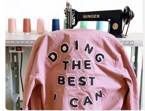 Meghan Markle wearing a custom chainstitch-embroidered sweatshirt, showcasing the power of celebrity influence on small businesses.