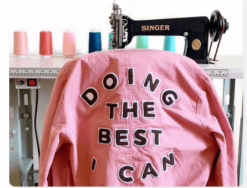 Meghan Markle wearing a custom chainstitch-embroidered sweatshirt, showcasing the power of celebrity influence on small businesses.